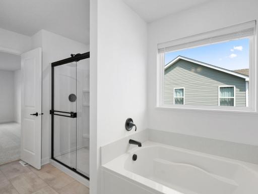 The soaking tub provides a spa-like experience