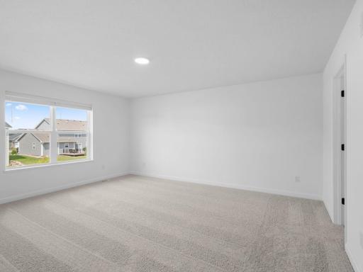 The owner’s suite is located upstairs, complete with a restful bedroom, an en-suite bathroom and a walk-in closet.