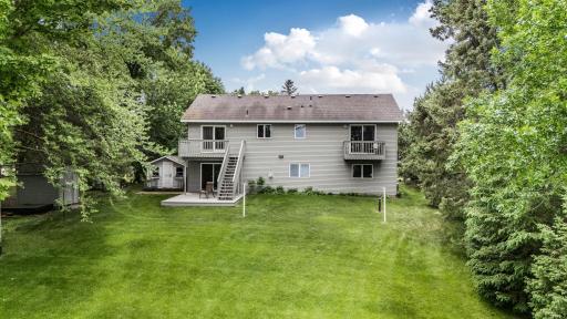 Large yard ideal for entertaining, outdoor dining, and summer activities.