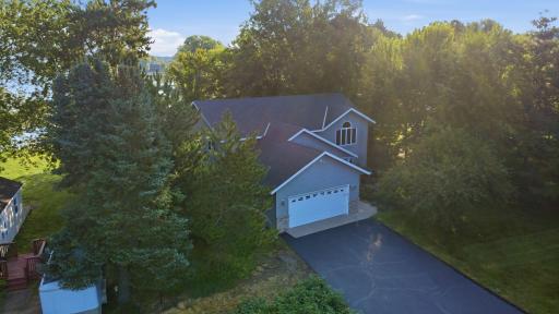 Towering trees line this lot with privacy.