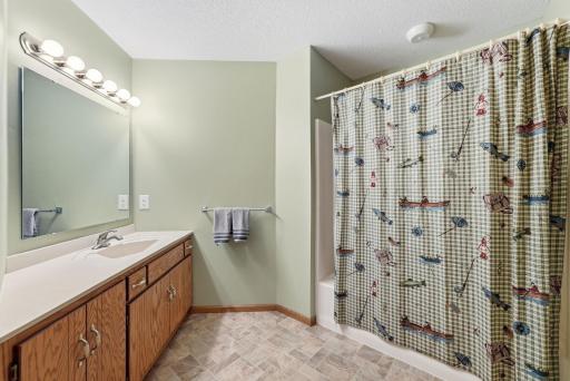 Upper level shared full bathroom.