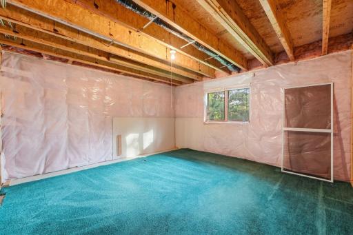 A clean, open lower level ready for your finishing touches.