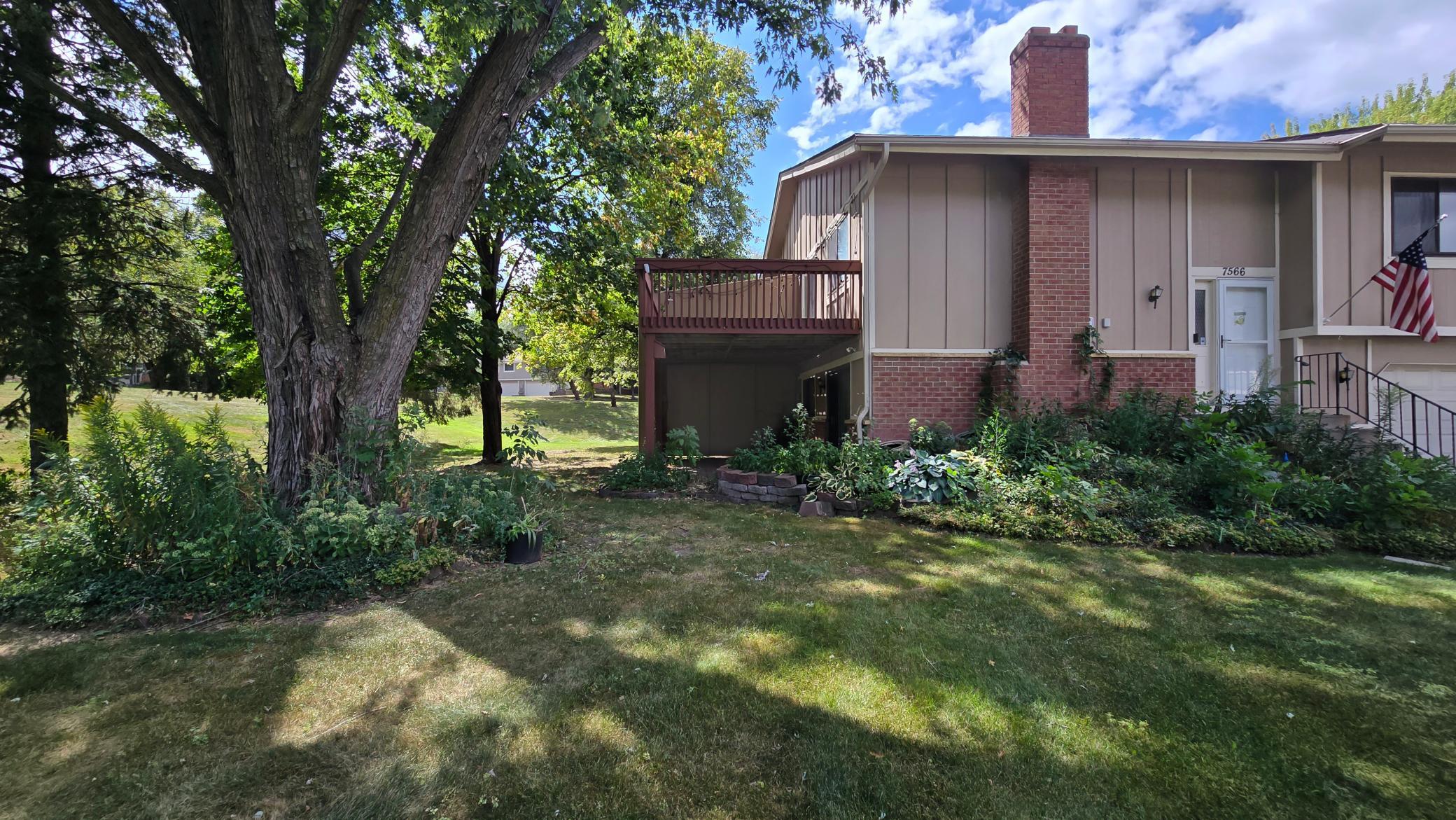Private backyard setting complete with shade trees and direct access to the back deck.
