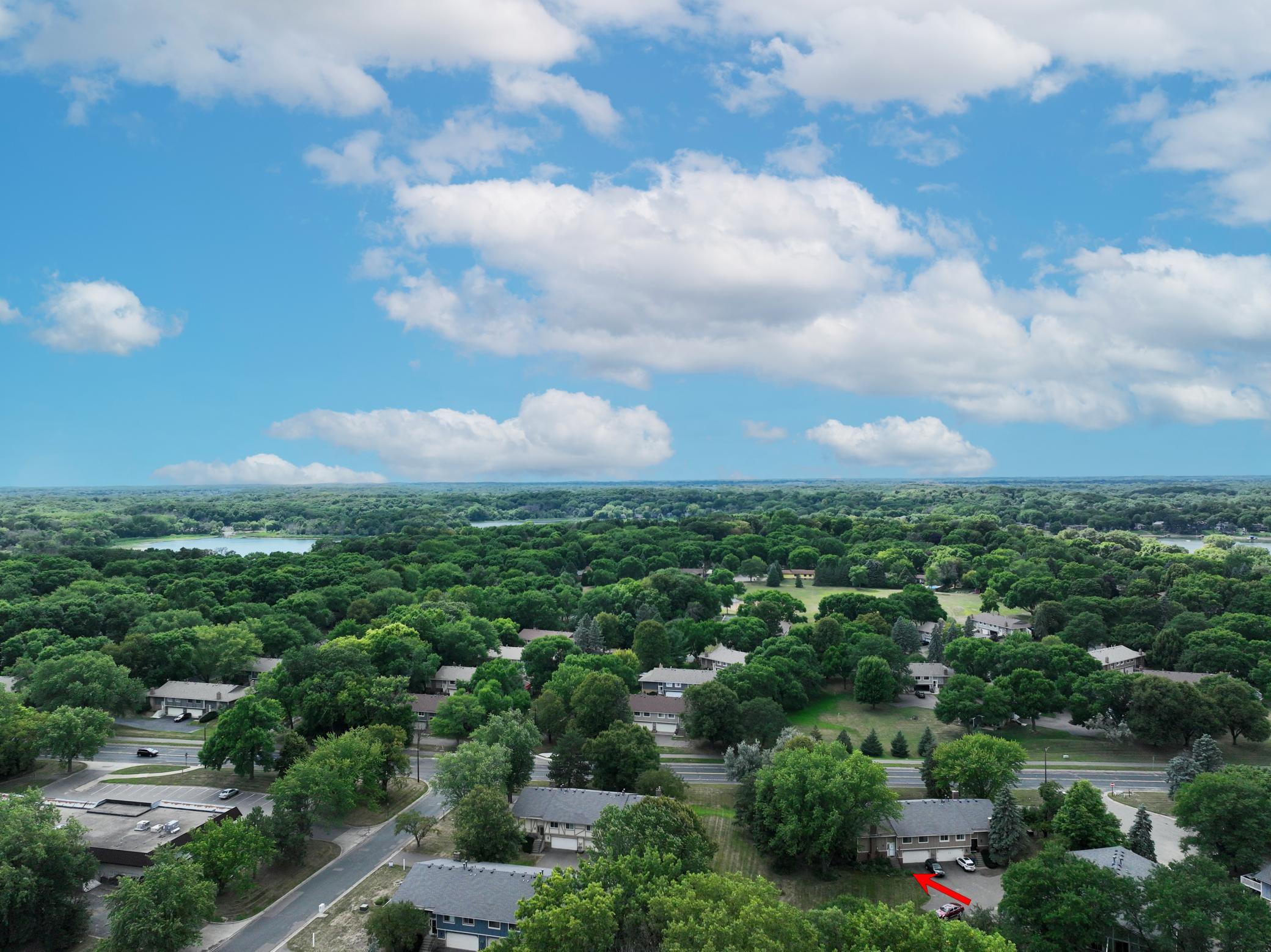 Elevated aerial view highlighting the property and its surrounding neighborhood.