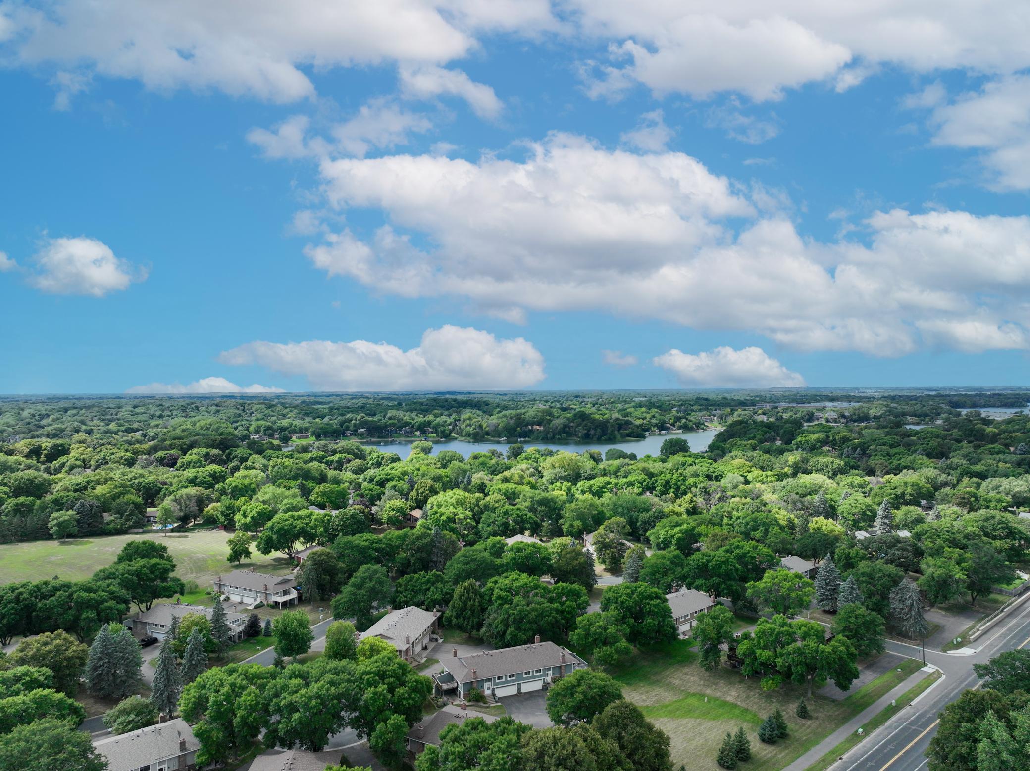 Scenic aerial perspective offering a broad view of the property and surrounding homes.