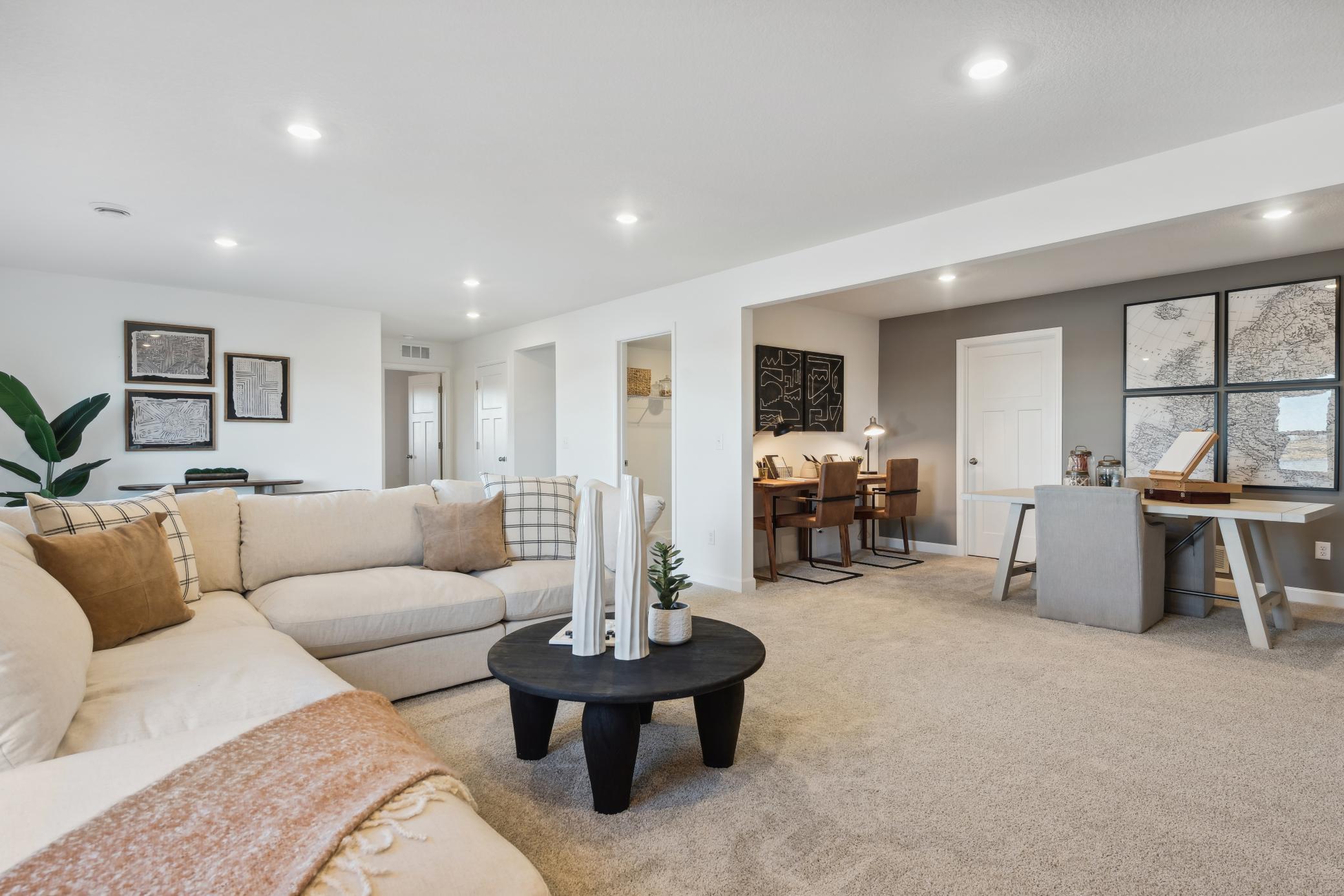 (Photo of an inventory home, actual homes finishes will vary) Enjoy the perfect spot to gather - the lower level rec room.