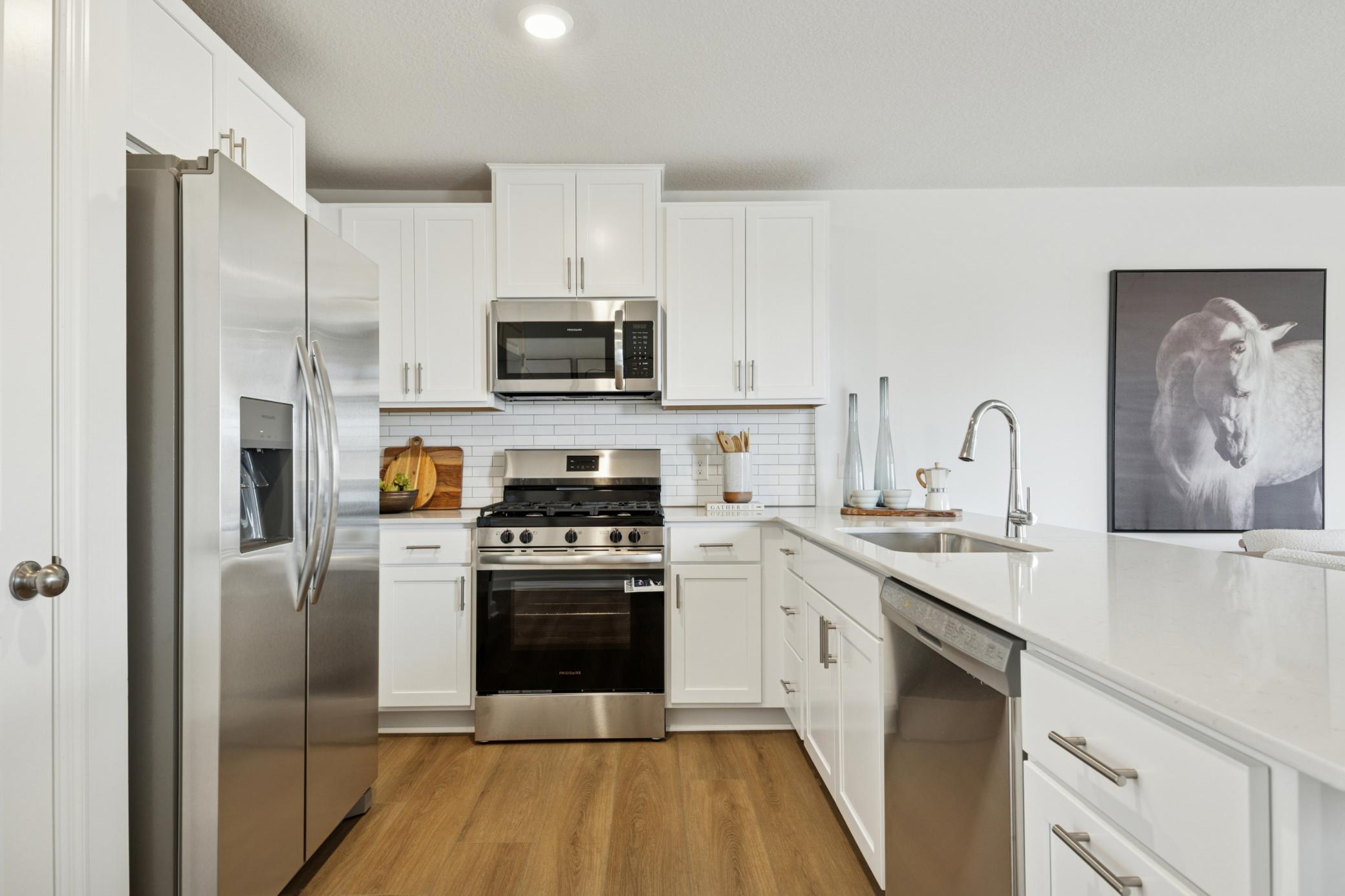 (Photo of a decorated model. Features and finishes will vary.) This home comes with Stainless Steel Appliances!