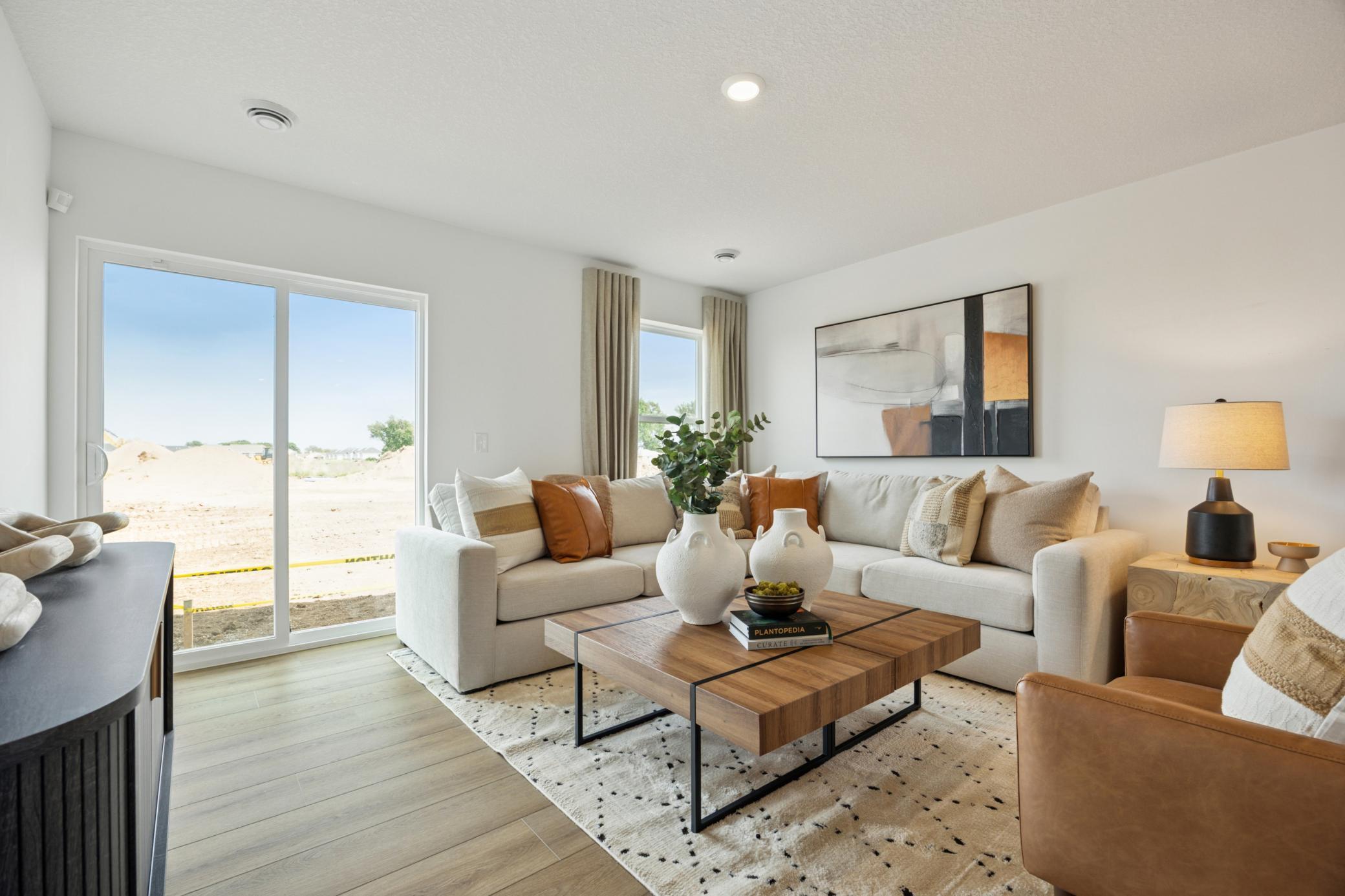 (Photo of a decorated model. Features and finishes will vary.) The large glass doors offer great views!