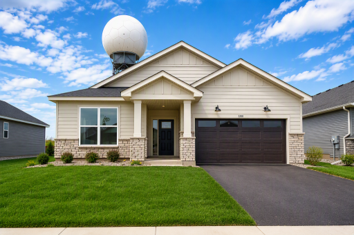 Welcome to 5200 Long Pointe Bay! (Photo is of the actual home.)