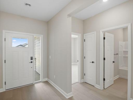 The two secondary bedrooms are situated down the hallway from the ownerâs suite to provide secluded retreats after a long day.