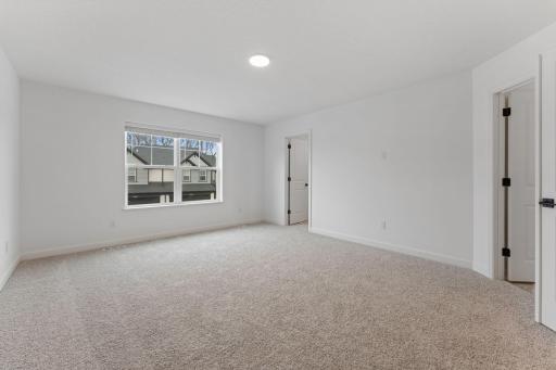 (Photo of a similar home, actual finishes may vary) Perfect for rejuvenation and restoration, the ownerâs suite boasts the largest bedroom in the home to provide restful nights, complete with an attached full-sized bathroom and large walk-in closet.