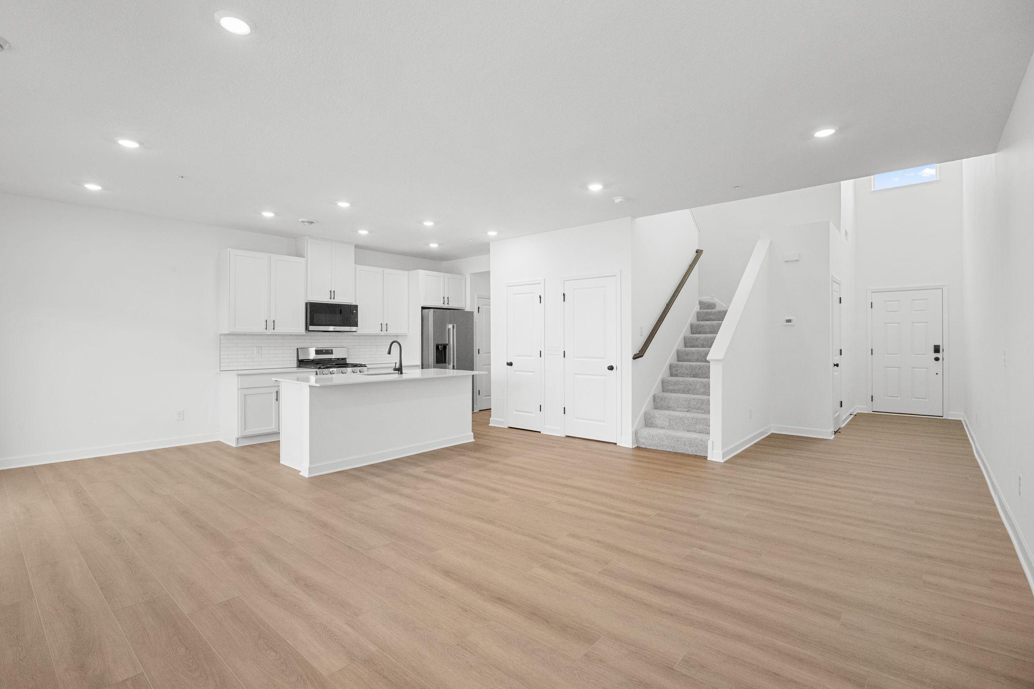 The natural gathering space of the home, the Great Room is excellent for entertaining guests, hosting movie marathons and relaxing with loved ones, paired with the simplicity of a free-flowing design.