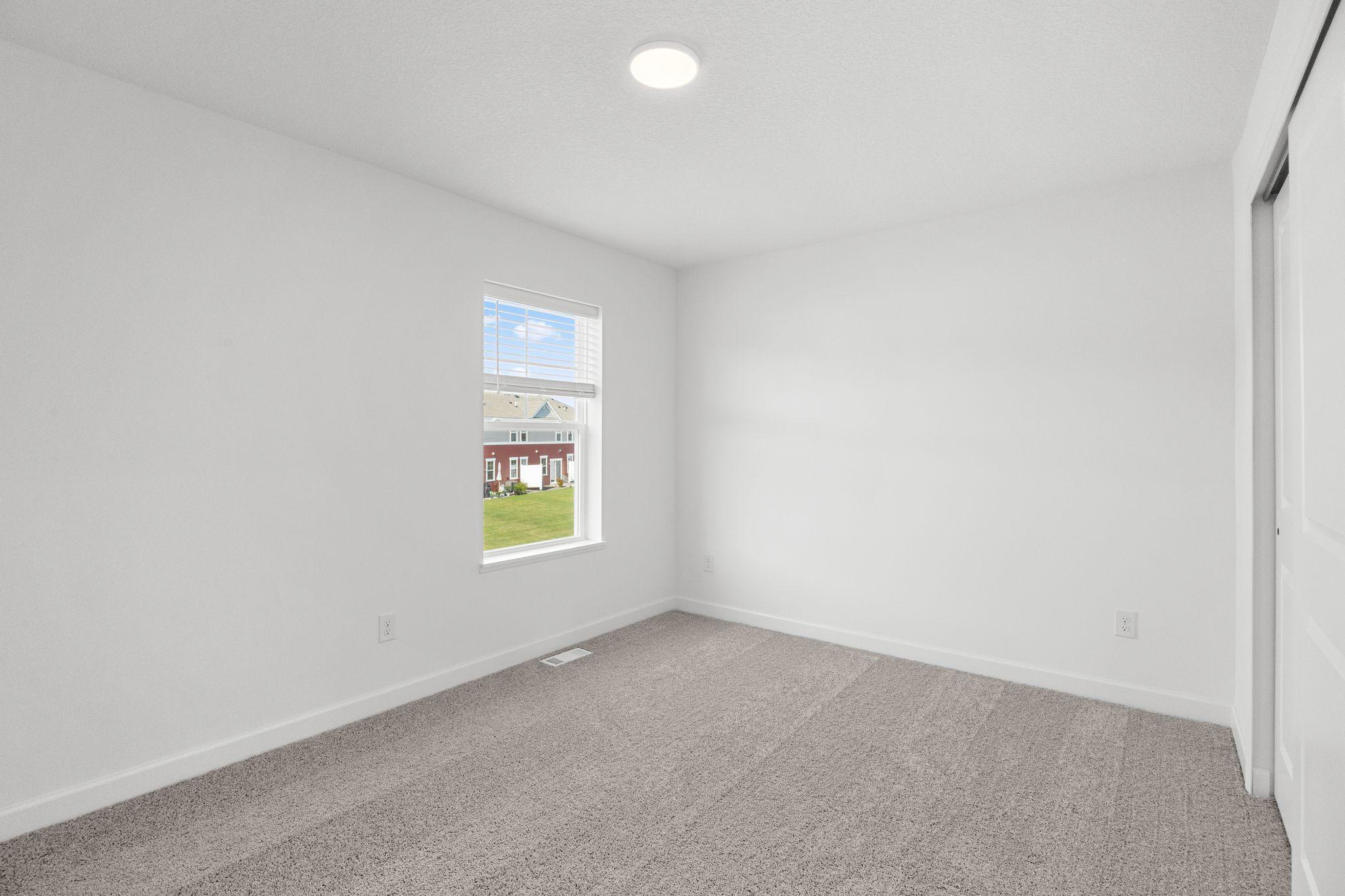 Each secondary bedroom includes premium wall-to-wall carpeting with 6 lb padding for enhanced comfort and a convenient closet