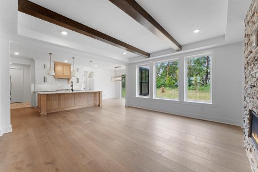 The dining area is conveniently located near the kitchen among the open layout