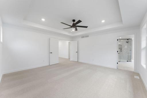 The ownerâs suite features plush wall-to-wall carpeting and ample space to accommodate a variety of furniture configurations