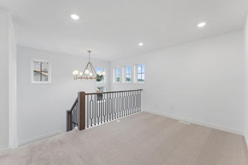 A versatile loft sits at the top of the stairs to provide a shared living space that everyone can enjoy.