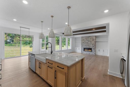 The inviting center island doubles as a breakfast bar, perfect for entertaining multiple guests