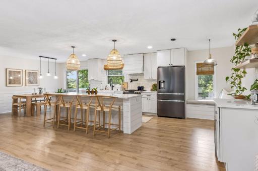 Entertaining was never easier - large dining room, countertop seating plus banquette seating