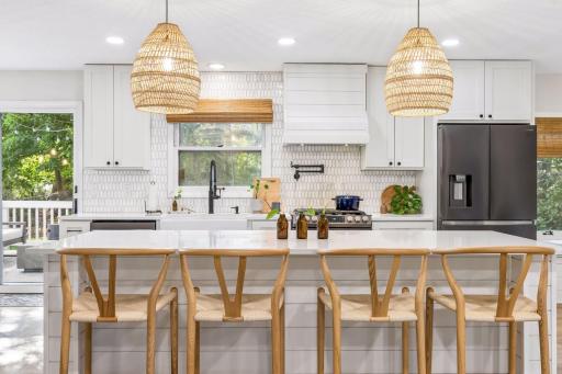 Samsung appliances, 5 burner gas stove, pot filler, and soft close cabinetry