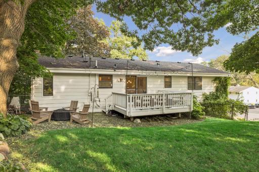 This backyard is an extension of the home - deck for relaxing plus firepit area - entertaining options regardless of the season!