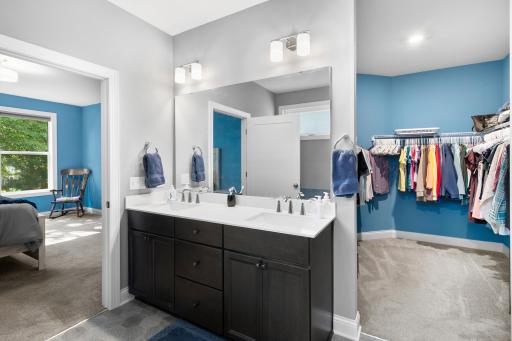 Walk in closet off of the primary bath makes it a easy to get ready for the day.