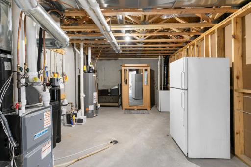 Mechanical room with plenty of space for storage.