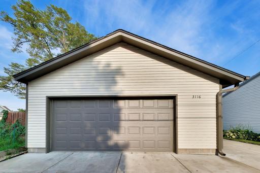 Two and a half car garage has a lot of extra storage