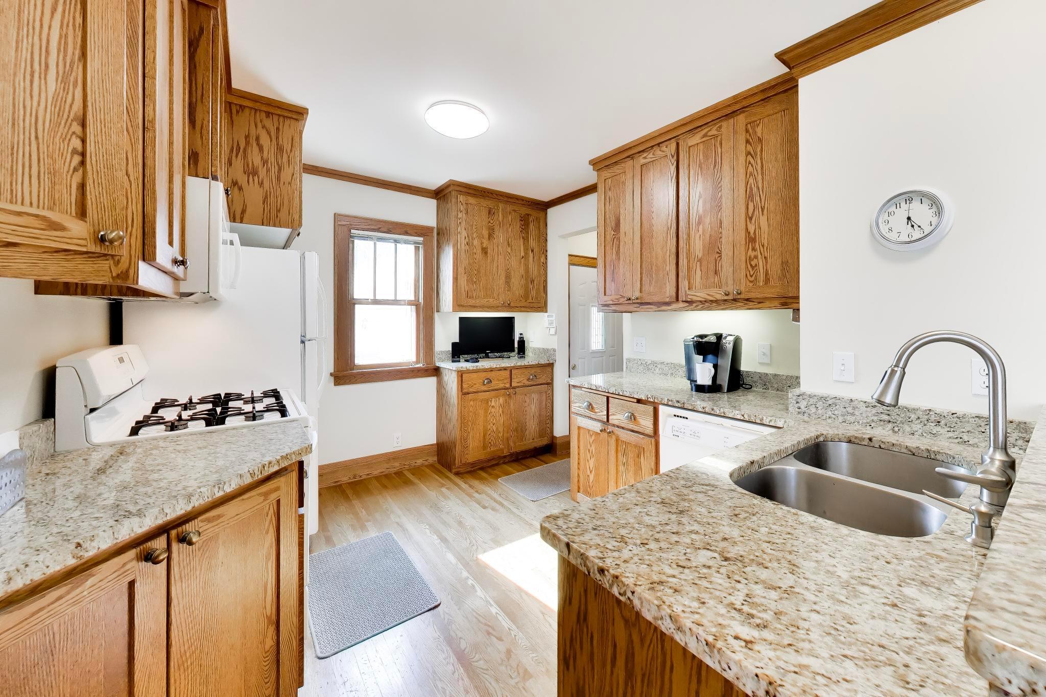 Custom oak cabinetry and floor