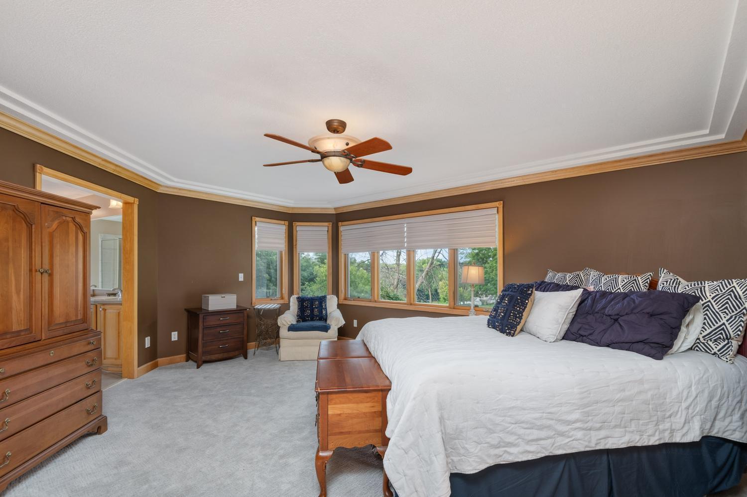 Large windows look out to the back yard and Lake Minnetonka views. The new plush carpeting feels wonderful under your feet!