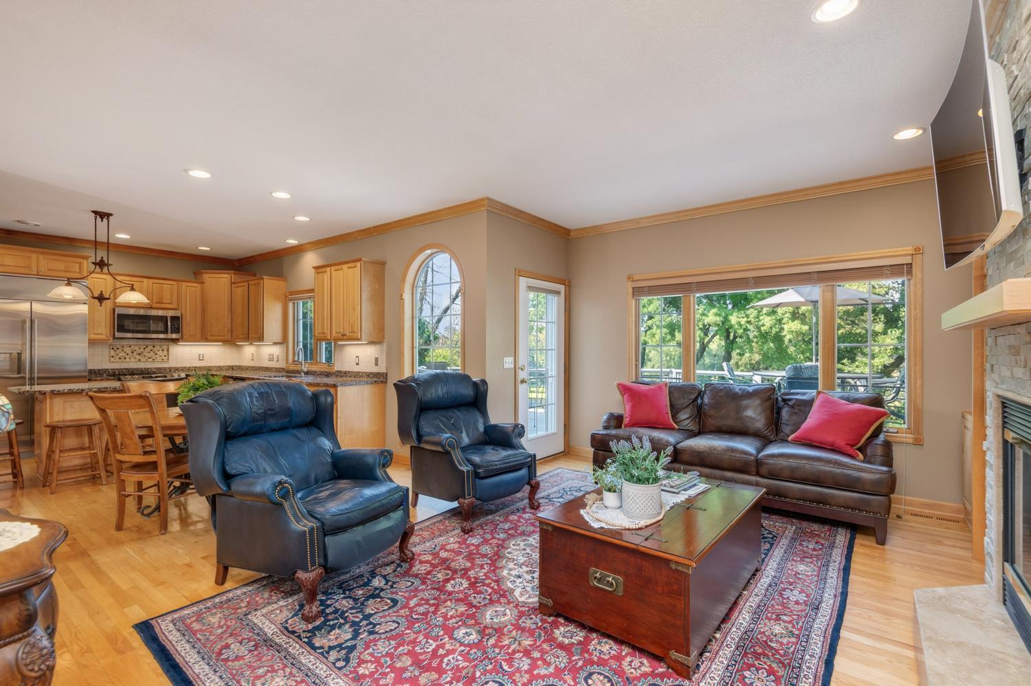 Large windows let in great natural light and look out to the back yard and the lake. A new door steps out to the deck.