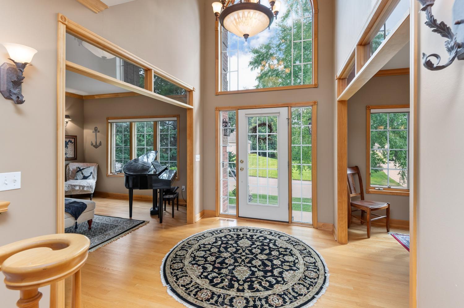Step inside where you will find beautiful wood floors throughout most of the main level. Imagine greeting family and guests here for the upcoming holidays!