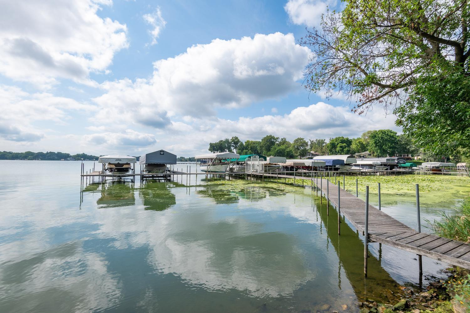 The third slip, which is empty, belongs to the owners at 1145 Cove Circle. You can slip a 28 foot boat here.