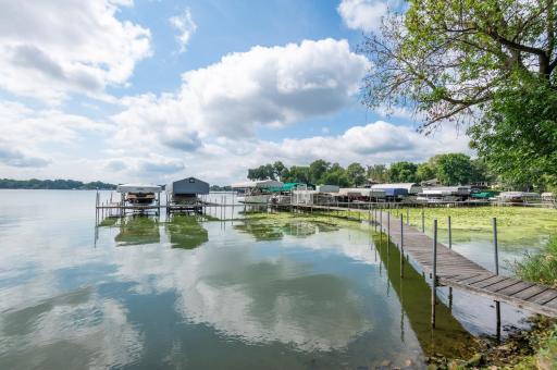 The third slip, which is empty, belongs to the owners at 1145 Cove Circle. You can slip a 28 foot boat here.