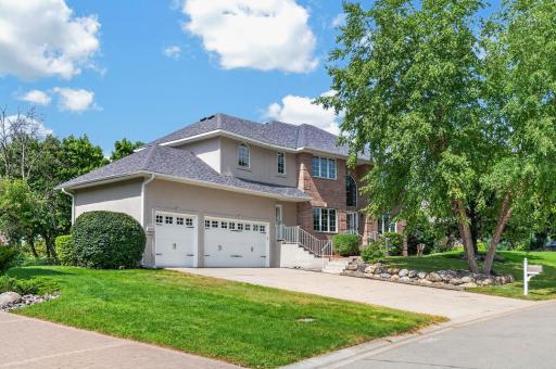 Great curb appeal includes two new premium insulated garage doors, concrete driveway and a lawn with irrigation system.