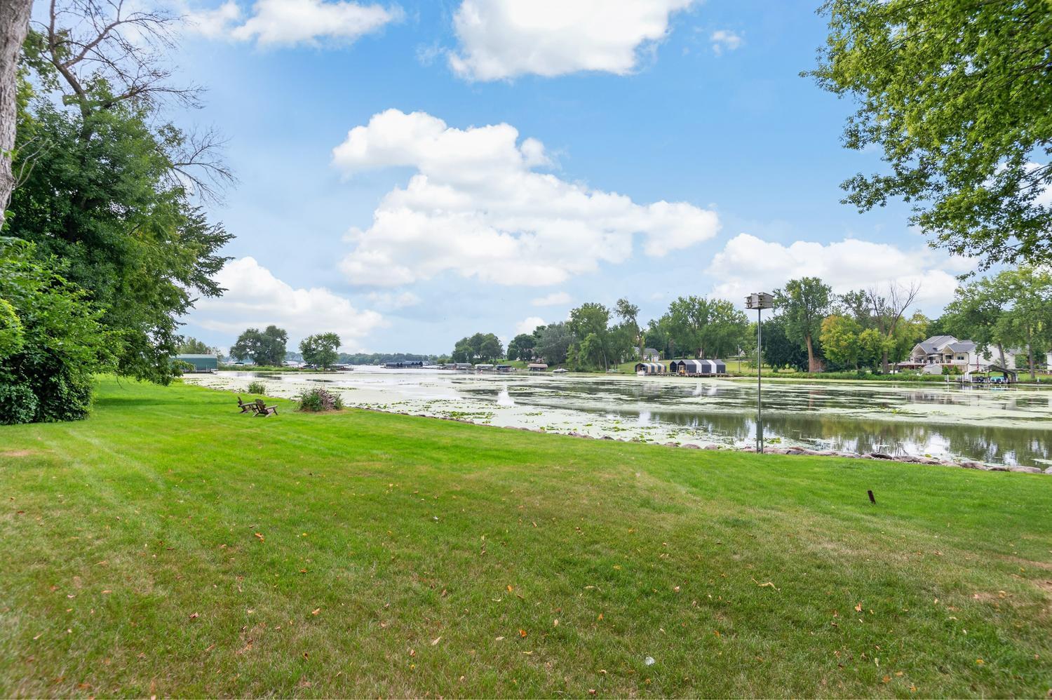 A large level area at your private lake frontage. Your boat slip is out at the group dock on the point.