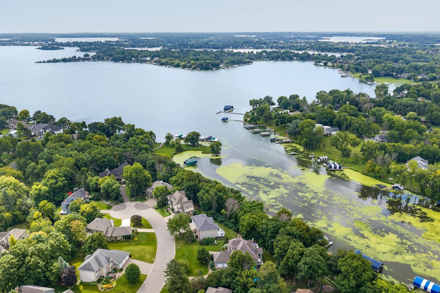 Aerial photo of the culdesac, Jennings Cove and Jennings Bay of Lake Minnetonka. You can see the out lot and dock in the center of the photo.