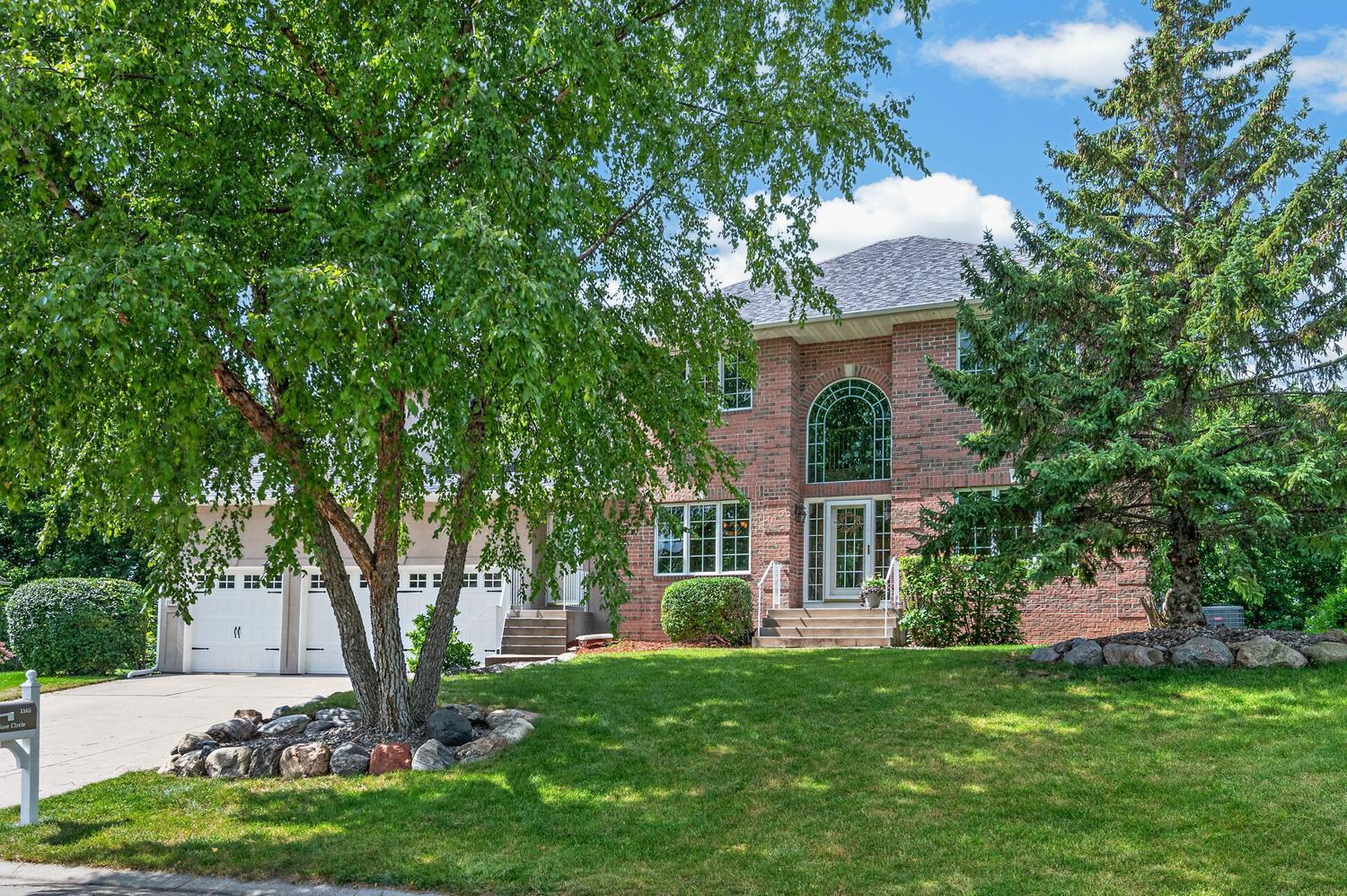 When you arrive at Cove Circle you will be impressed! You can purchase this beautiful two story home on Lake Minnetonka.