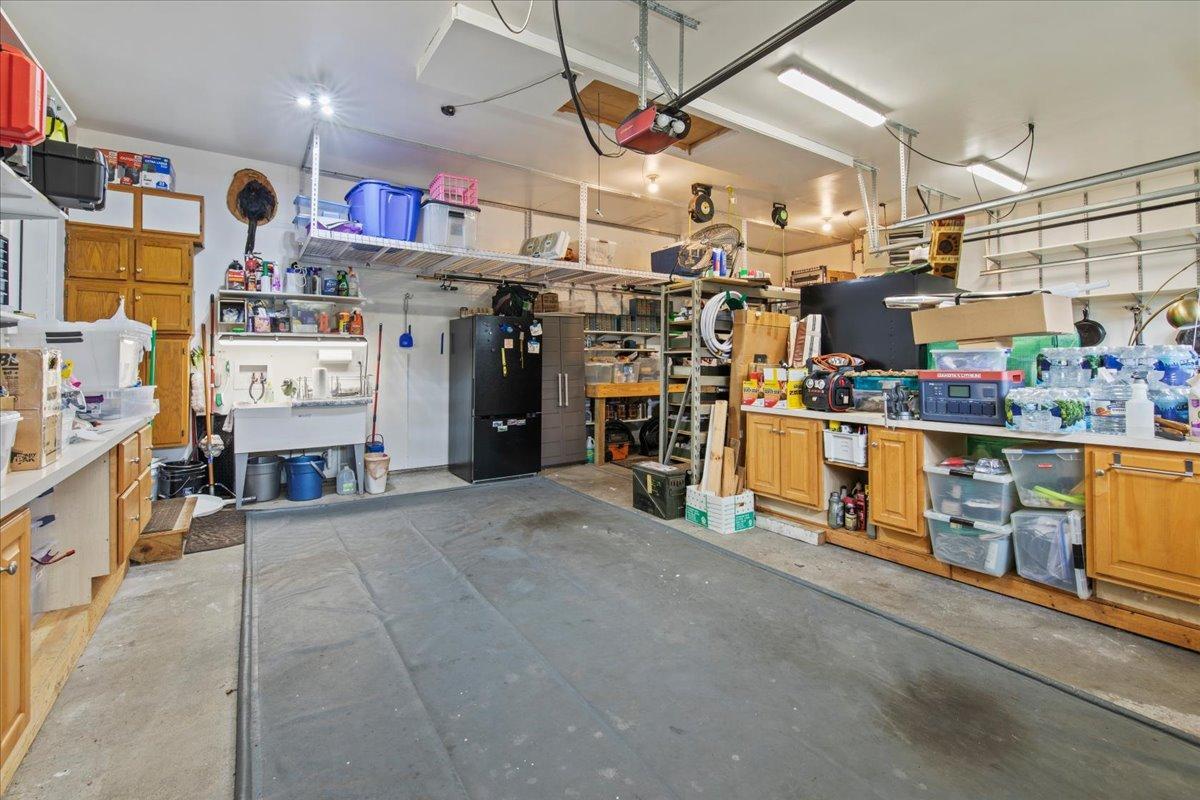 The 3 stall garage is fully insulated and heated.