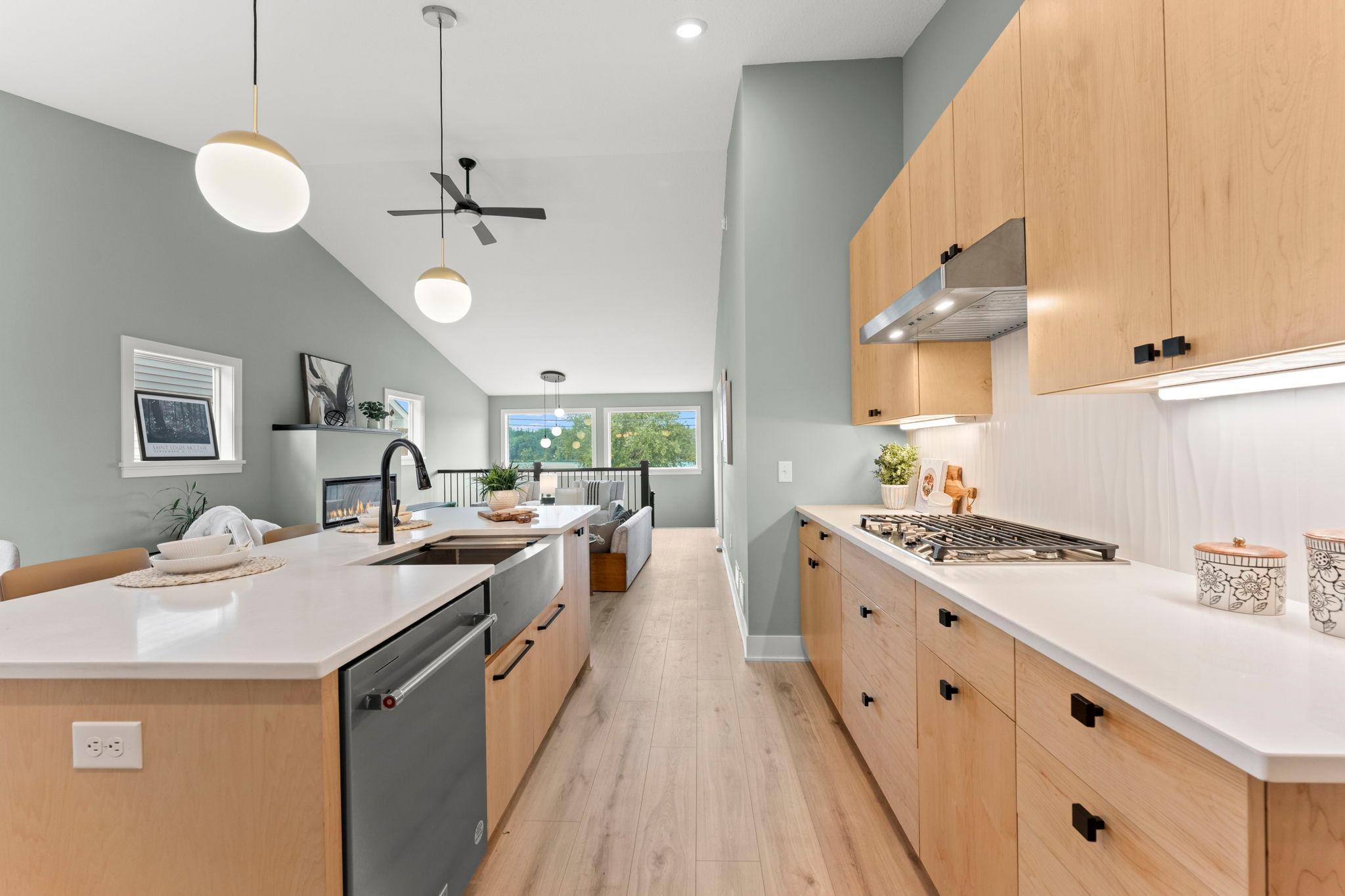 Thoughtfully designed kitchen with a center island, abundant cabinetry and modern appliances