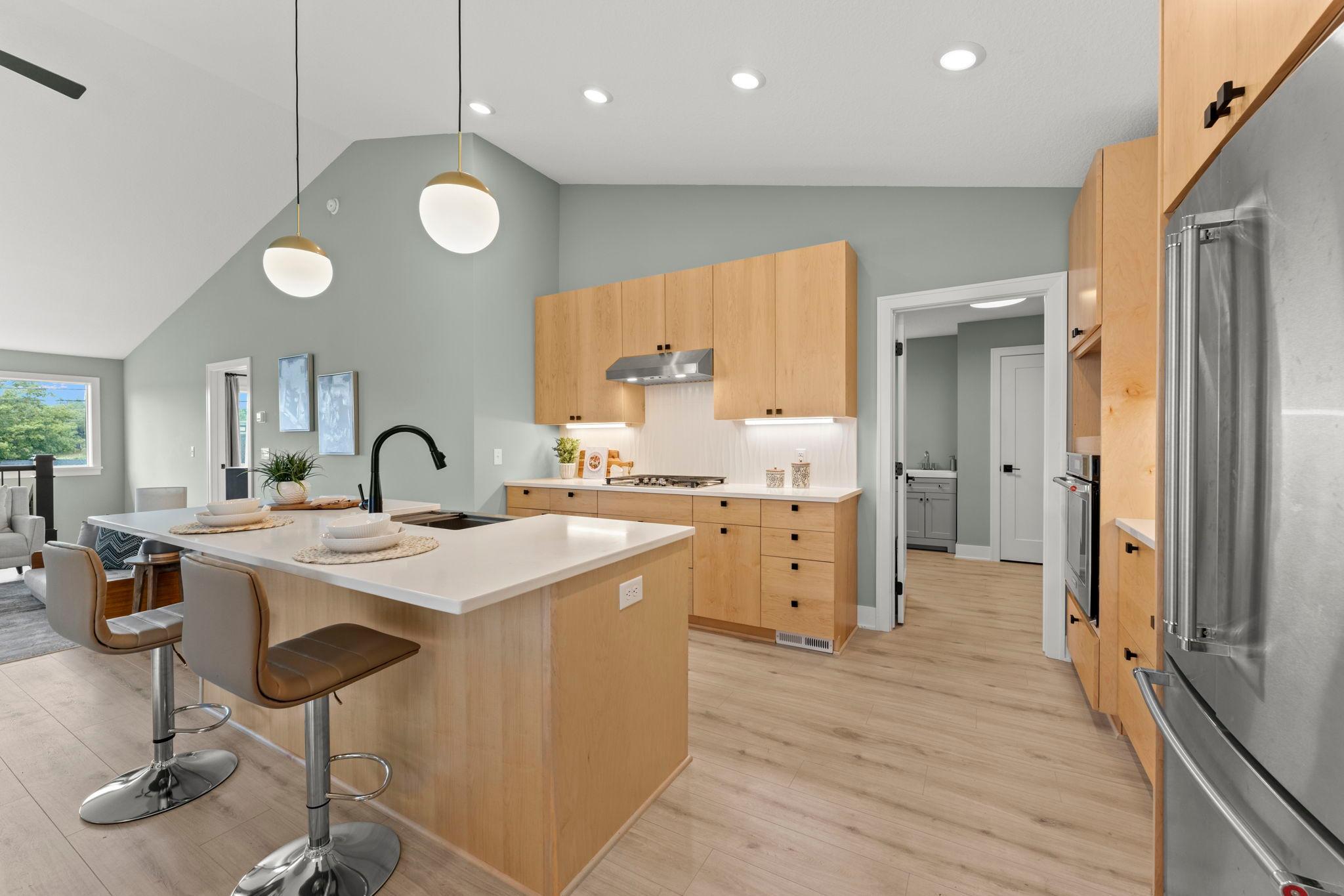 A bright and functional kitchen with abundant cabinetry and generous workspace