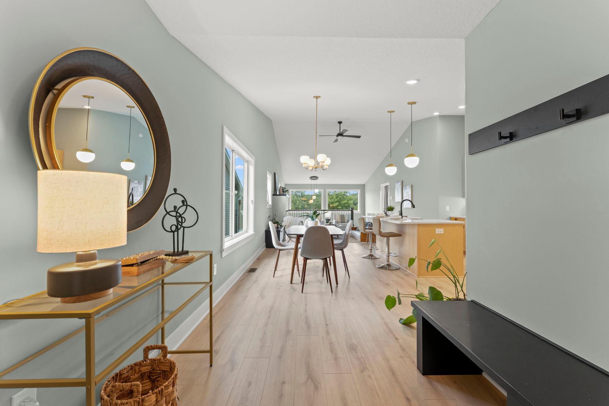 A bright and open entryway welcomes you into the heart of the home