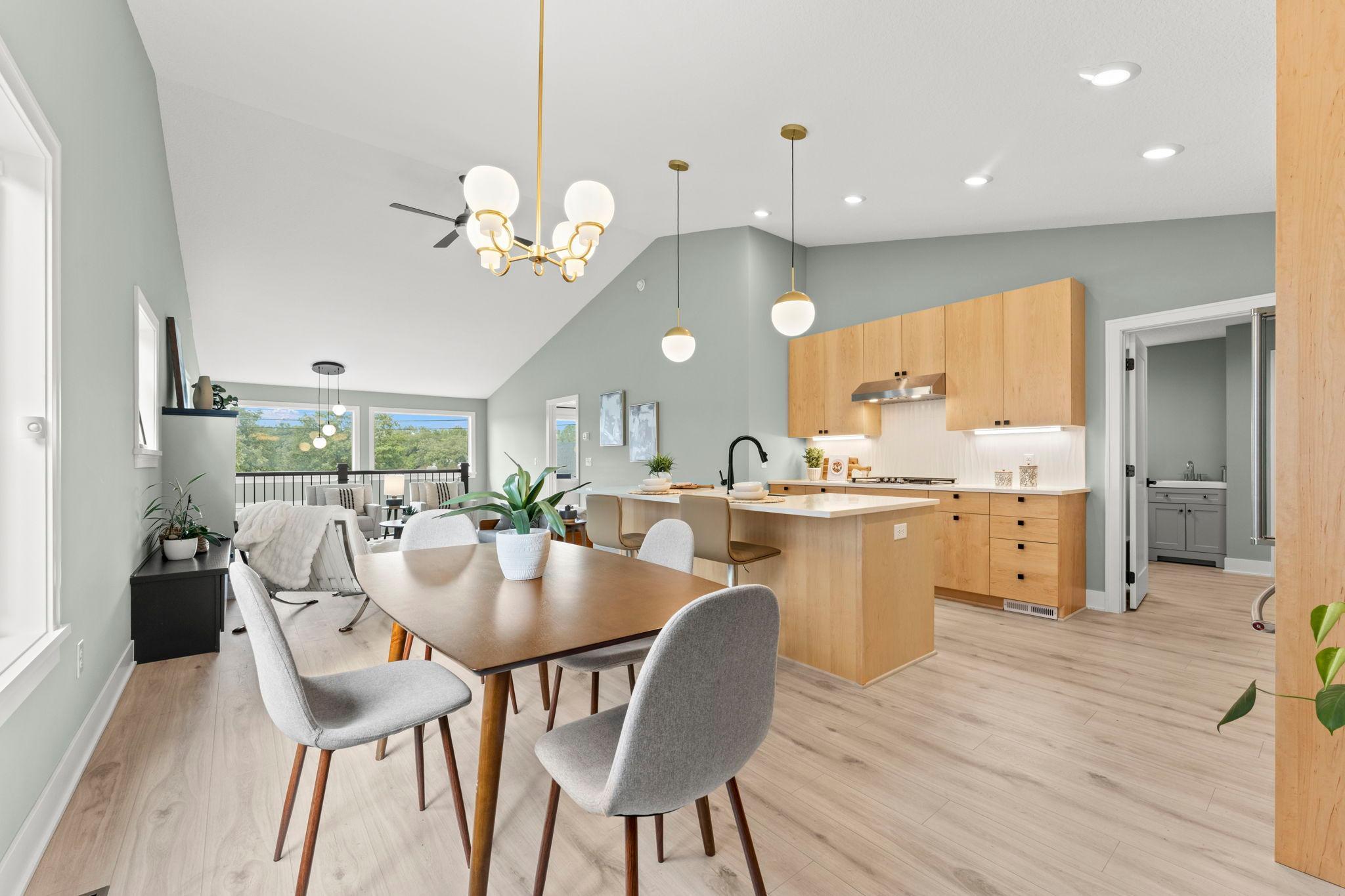 Open dining and kitchen areas create a wonderful setting for meals and entertaining