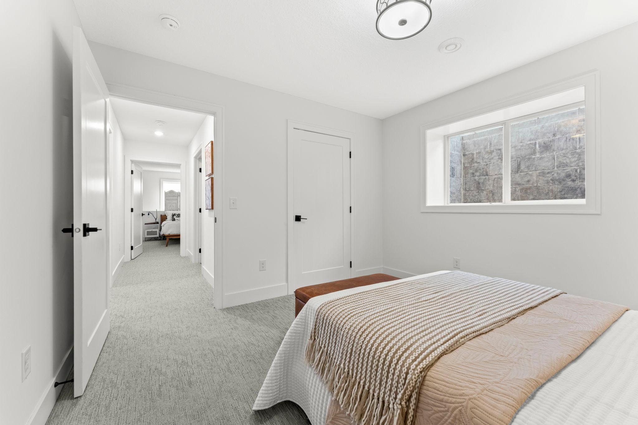 Both lower level bedrooms offers generous space and convenient access to the hallway