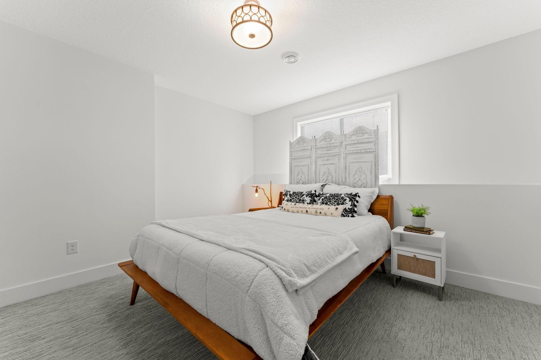 Another view of the bright and comfortable lower level bedroom