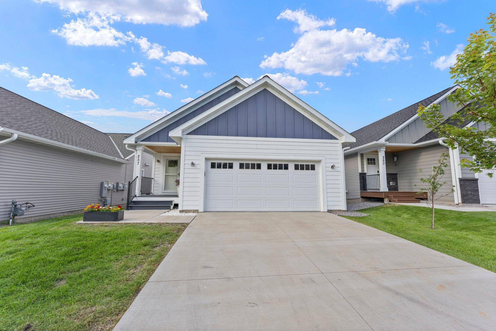 Attractive exterior with a spacious two car garage and new roof and siding in 2026