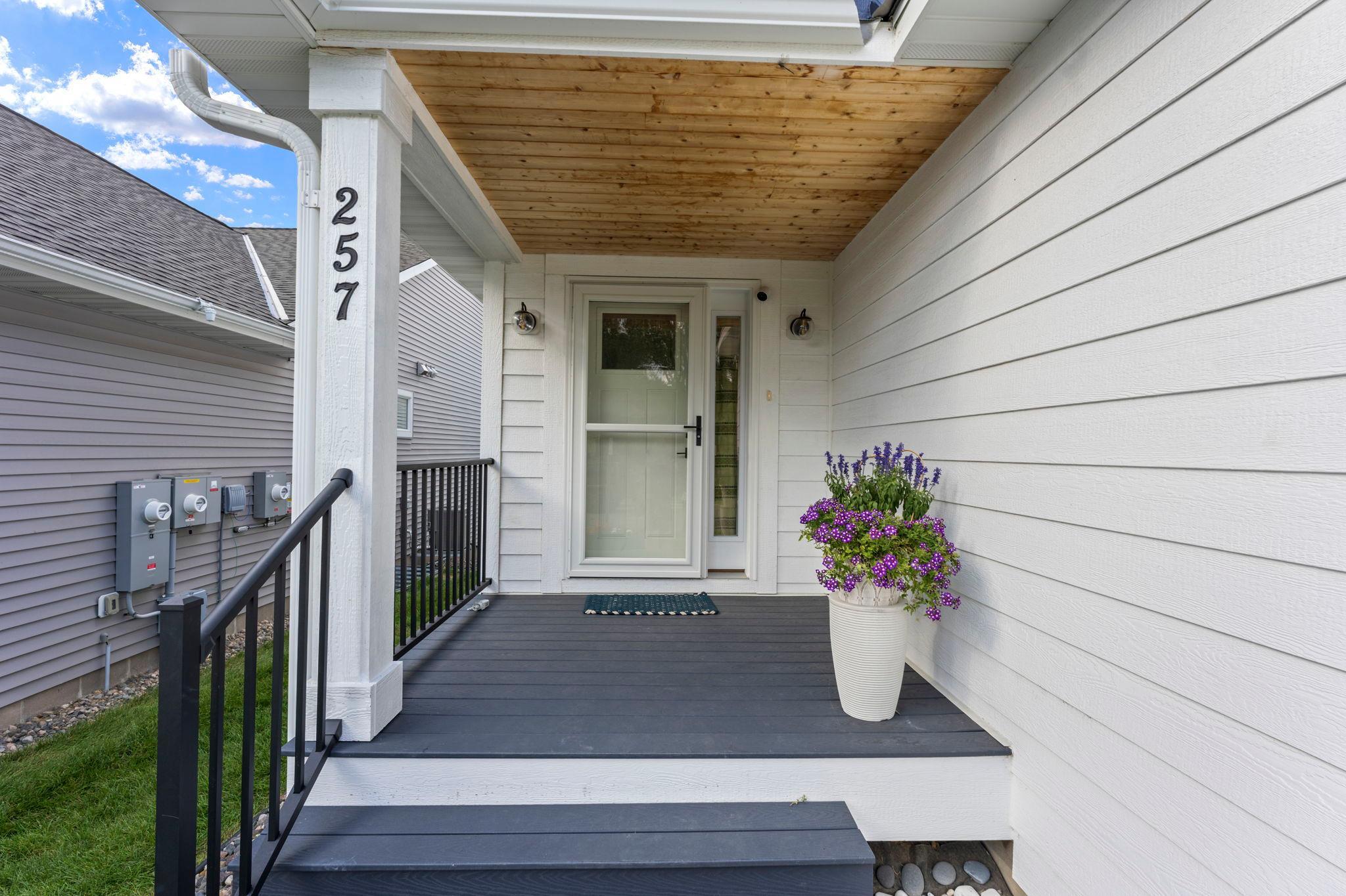 A warm and welcoming covered front entrance