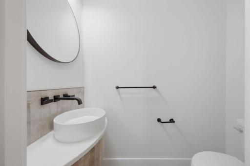Photo of similar model - 1/2 bathroom on main level
