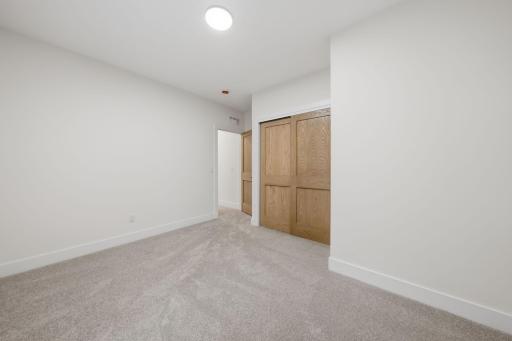 Photo of similar model - bedroom 1/2 in lower level