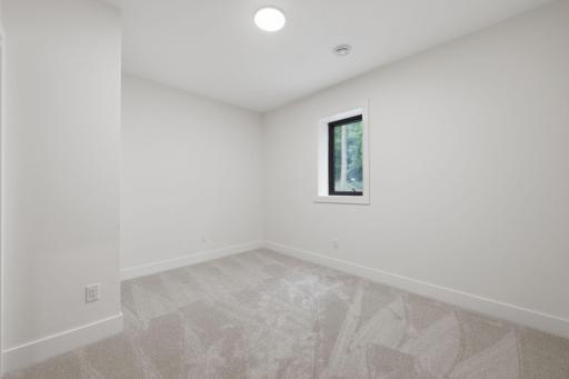 Photo of similar model - bedroom 1/2 in lower level