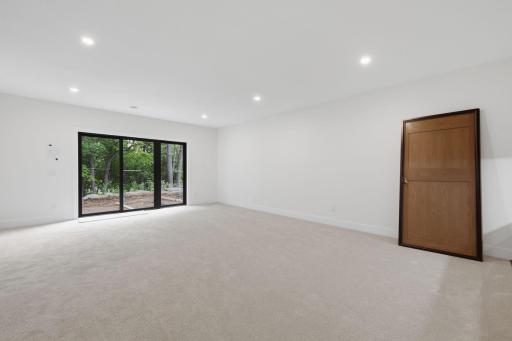 Photo of similar model - family room walks out to paver patio